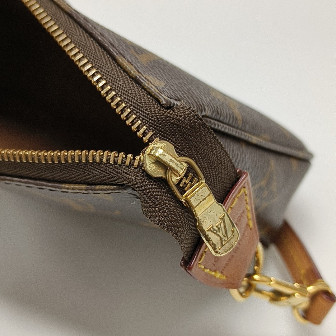 ACCESSOIRES GM Monogram Coated Canvas Brown
