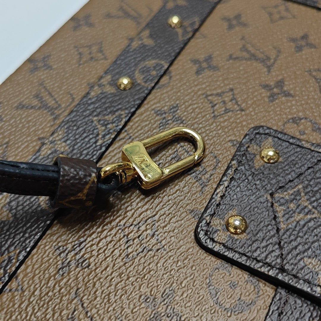 PETITE MALLE Monogram Coated Canvas Brown