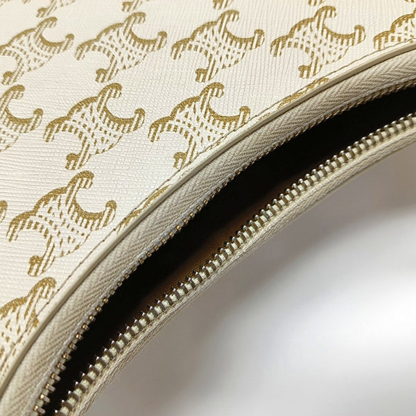 Authenticated pre-owned  AVA Coated Canvas Beige - Top Handle Bag at Looply