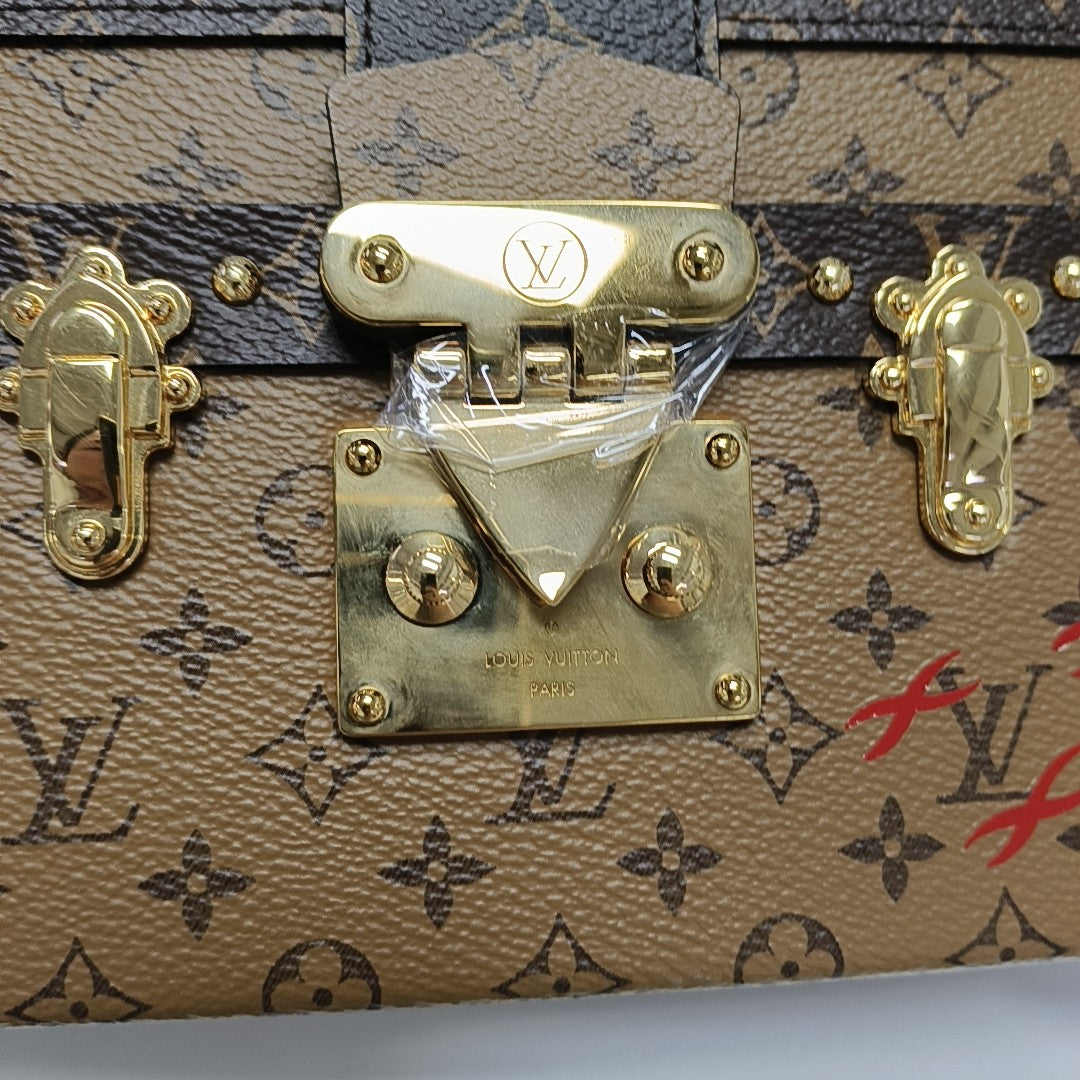 PETITE MALLE Monogram Coated Canvas Brown