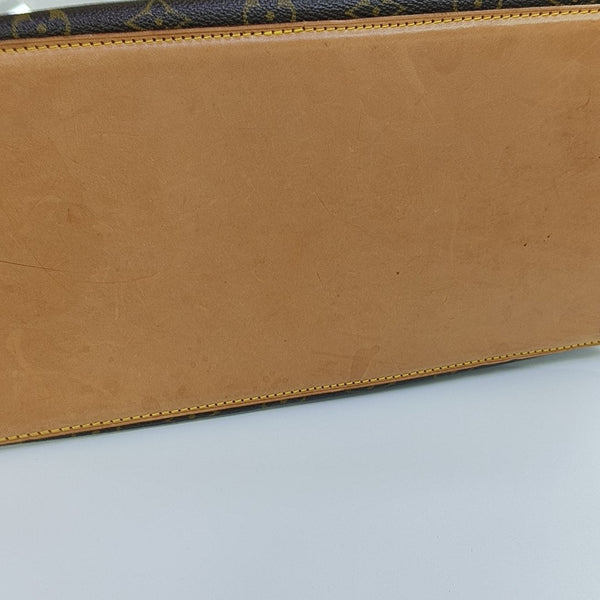 PIANO Monogram Coated Canvas Brown