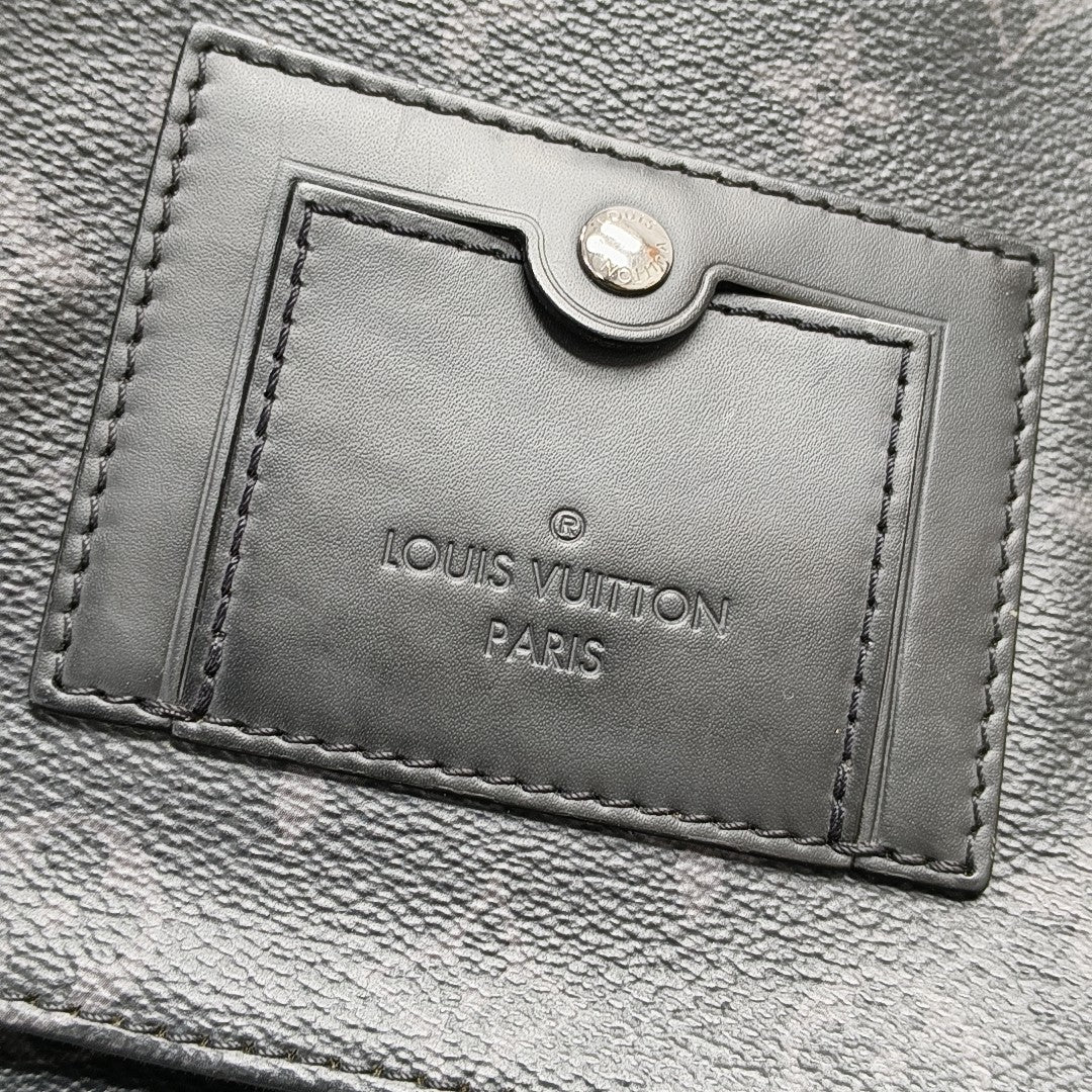 VOYAGER PM Monogram Coated Canvas Black