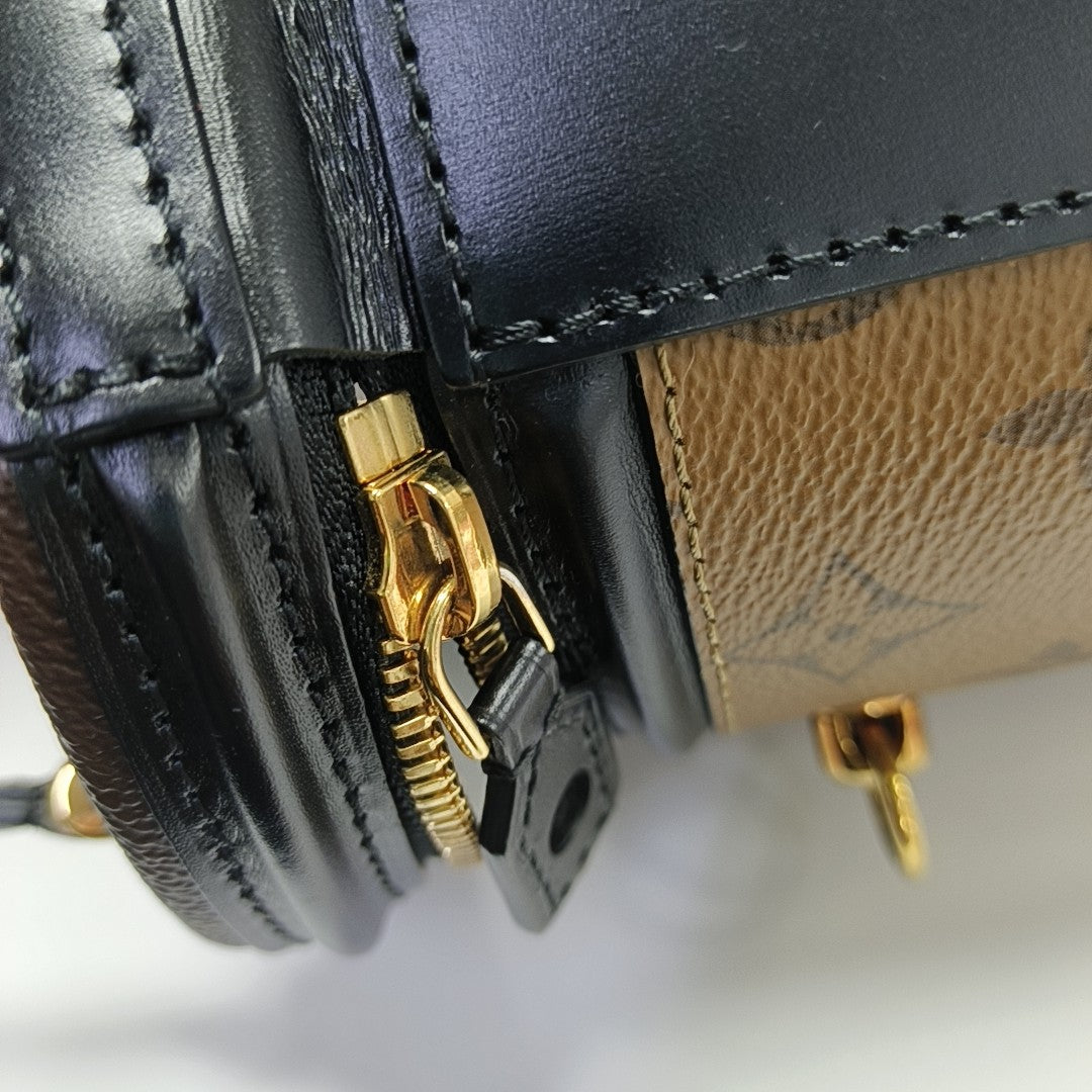 CANNES PM Monogram Coated Canvas Brown