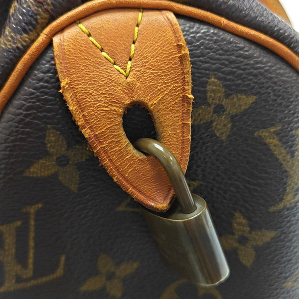SPEEDY 25 Monogram Coated Canvas Brown