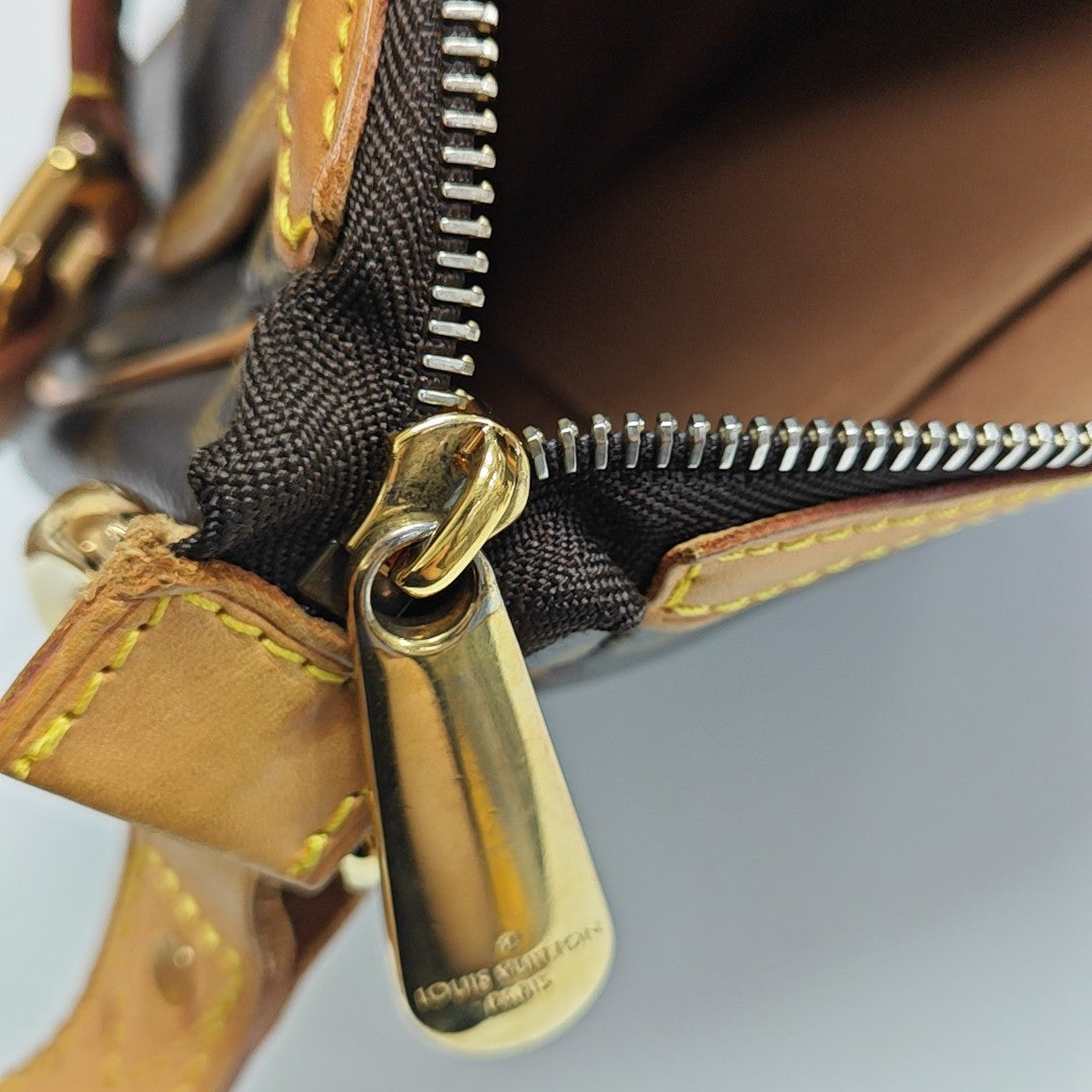 TULUM PM Monogram Coated Canvas Brown