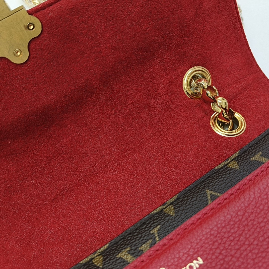 VICTOIRE Monogram Coated Canvas Brown