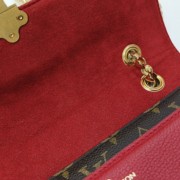 VICTOIRE Monogram Coated Canvas Brown