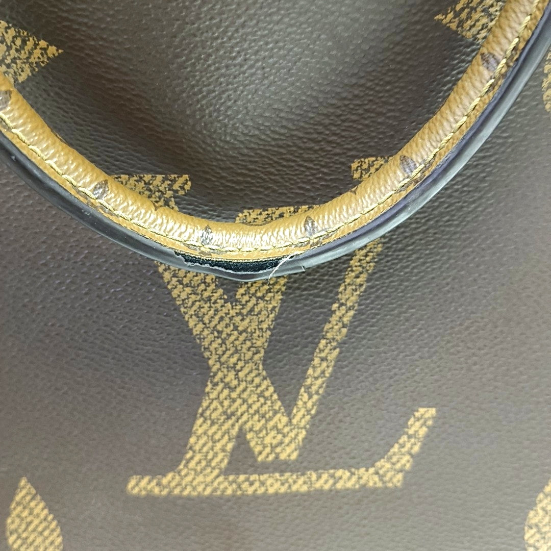 ONTHEGO GM Monogram Coated Canvas Brown