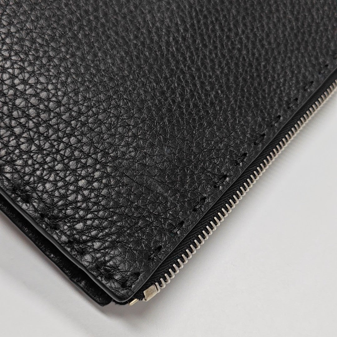 Authenticated pre-owned  Monster Calfskin Black - Clutch at Looply