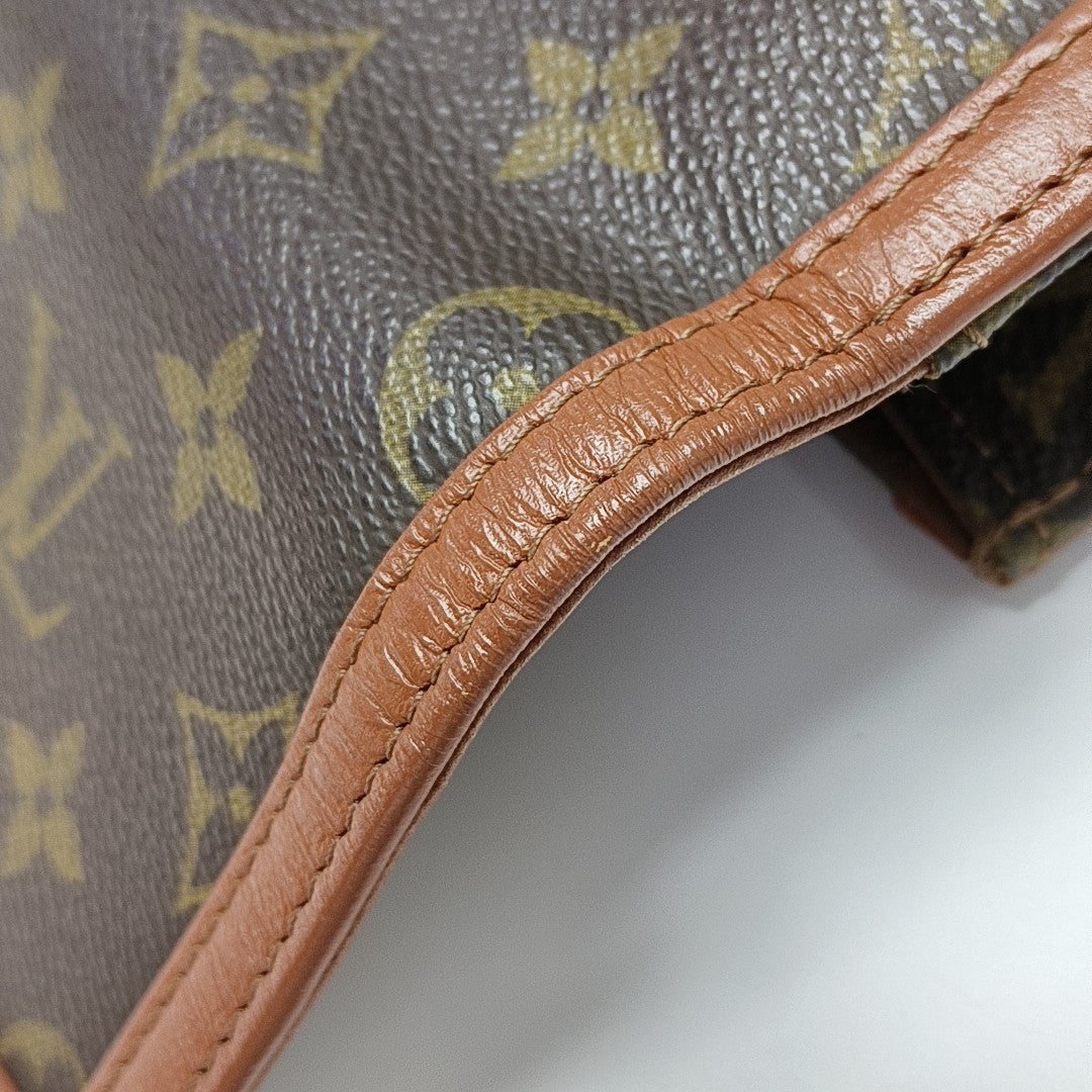 DAME Monogram Coated Canvas Brown