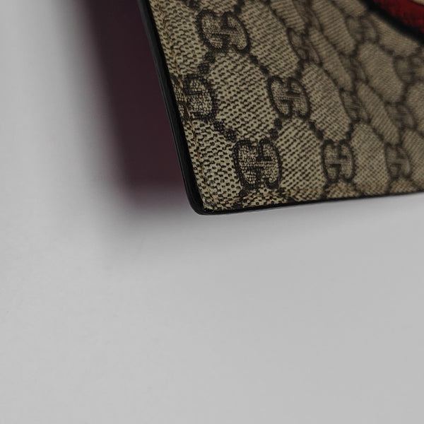Monogram Coated Canvas Clutch Beige