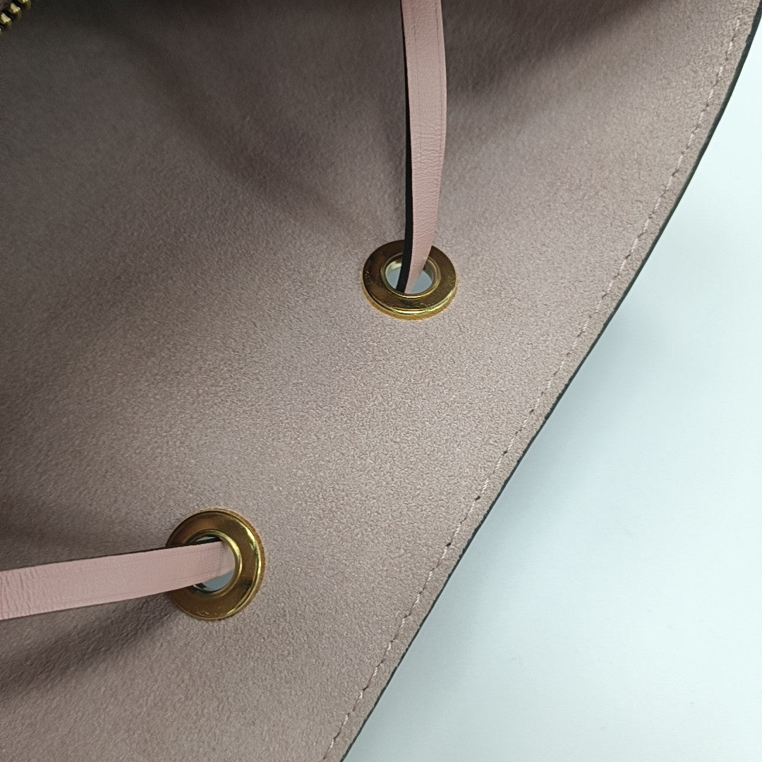 NÉONOÉ MM Monogram Coated Canvas Brown