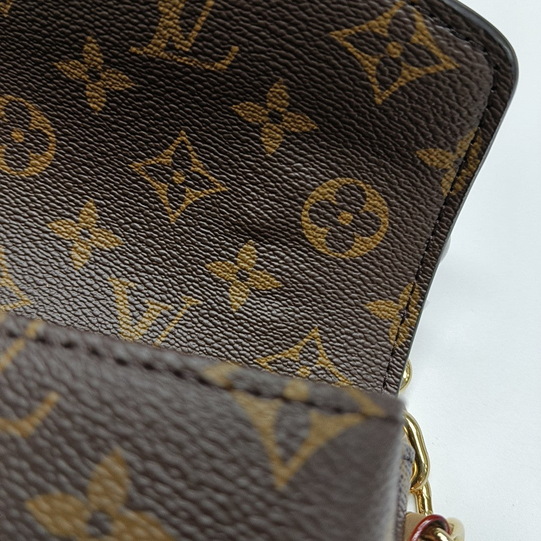 MÉTIS EAST WEST Monogram Coated Canvas Brown