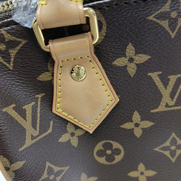 SPEEDY 20 Monogram Coated Canvas Brown