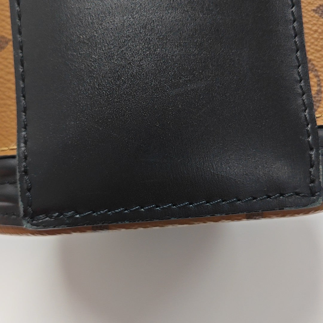 CANNES PM Monogram Coated Canvas Brown