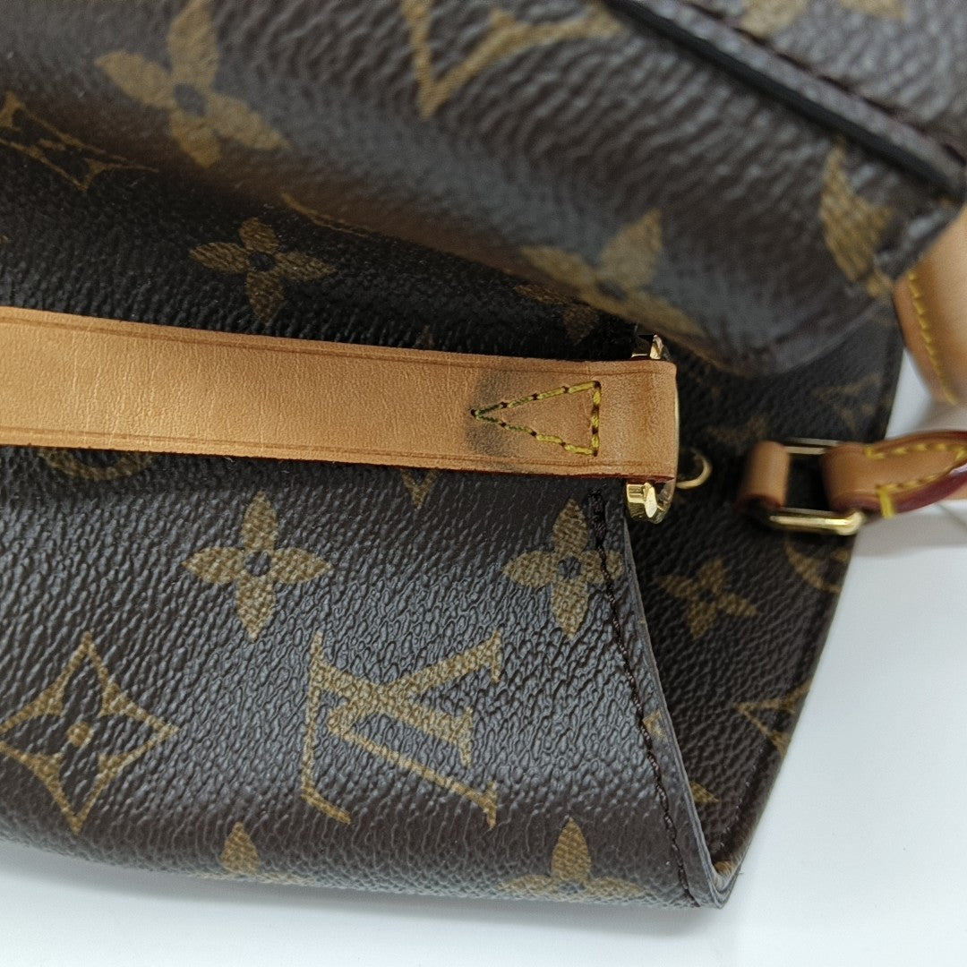 MONTAIGNE GM Monogram Coated Canvas Brown