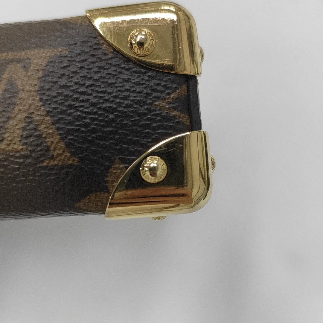 SLIM TRUNK Monogram Coated Canvas Brown