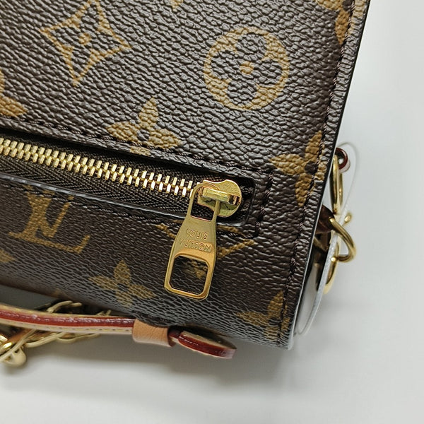 MÉTIS EAST WEST Monogram Coated Canvas Brown