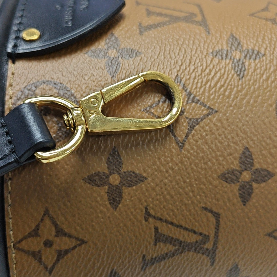 CANNES PM Monogram Coated Canvas Brown