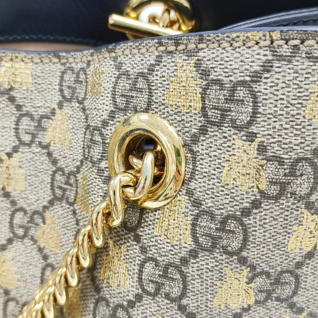 Padlock Medium Monogram Coated Canvas Brown