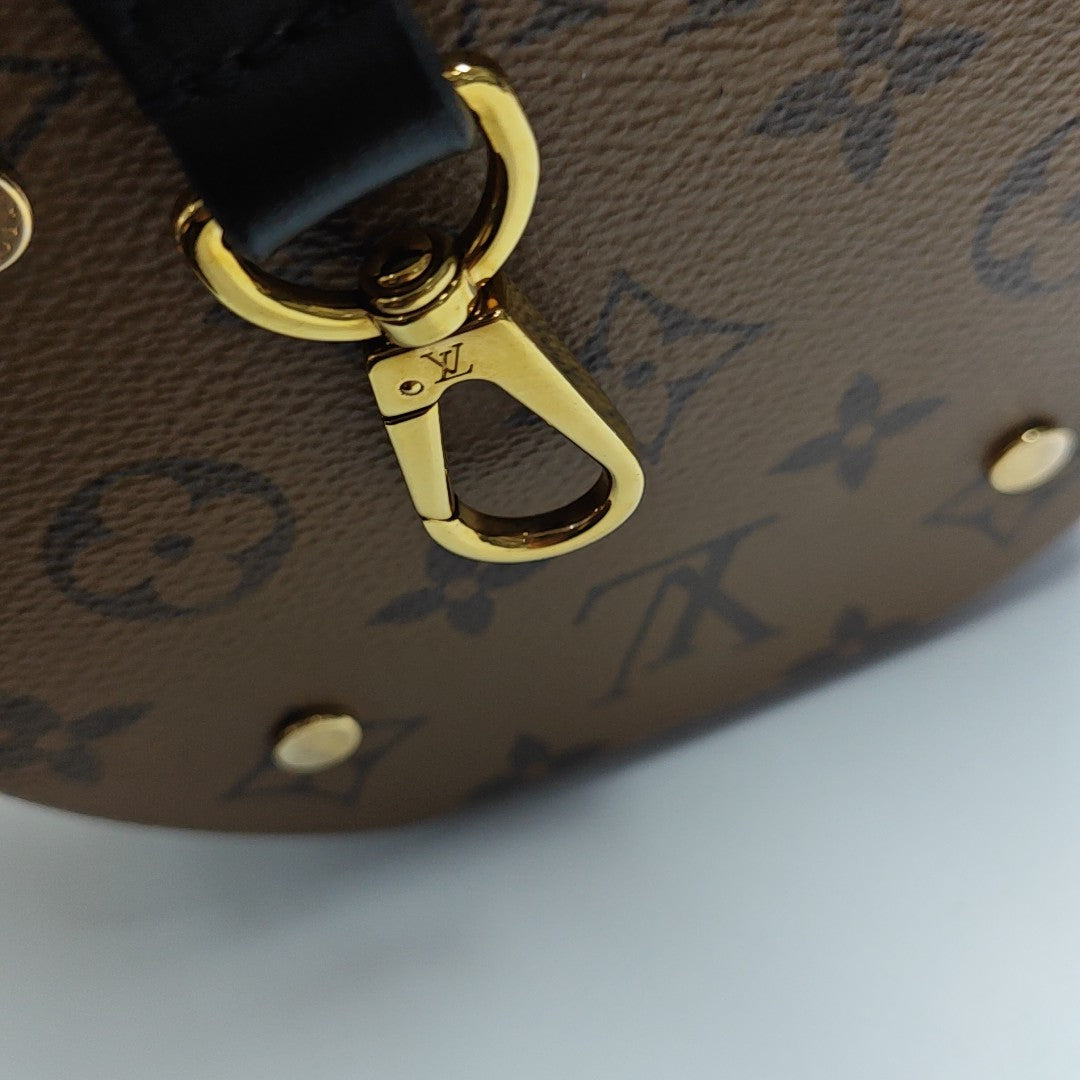 CANNES PM Monogram Coated Canvas Brown