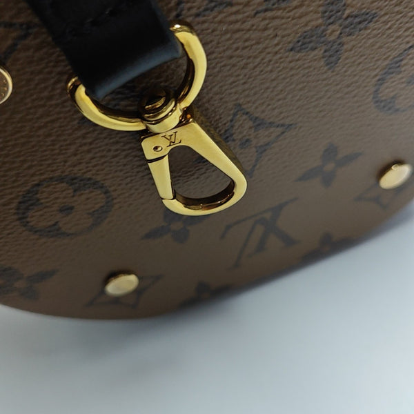 CANNES PM Monogram Coated Canvas Brown