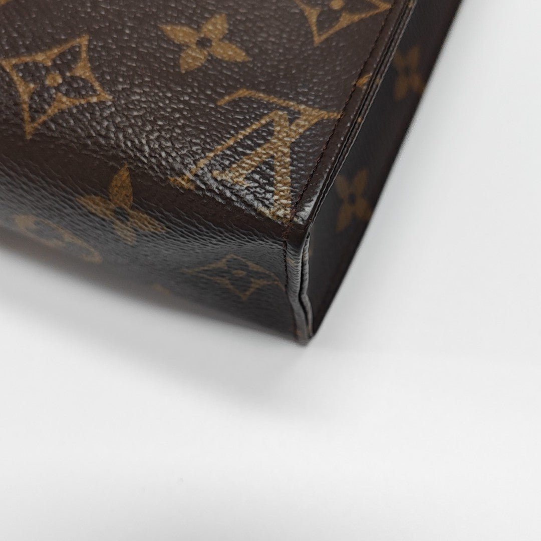 TOILET POCKET 19 Monogram Coated Canvas Brown