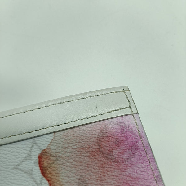 Pochette Voyag MM Monogram Coated Canvas White