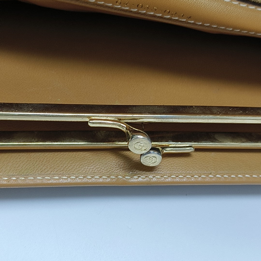 Monogram Coated Canvas Wallet Brown