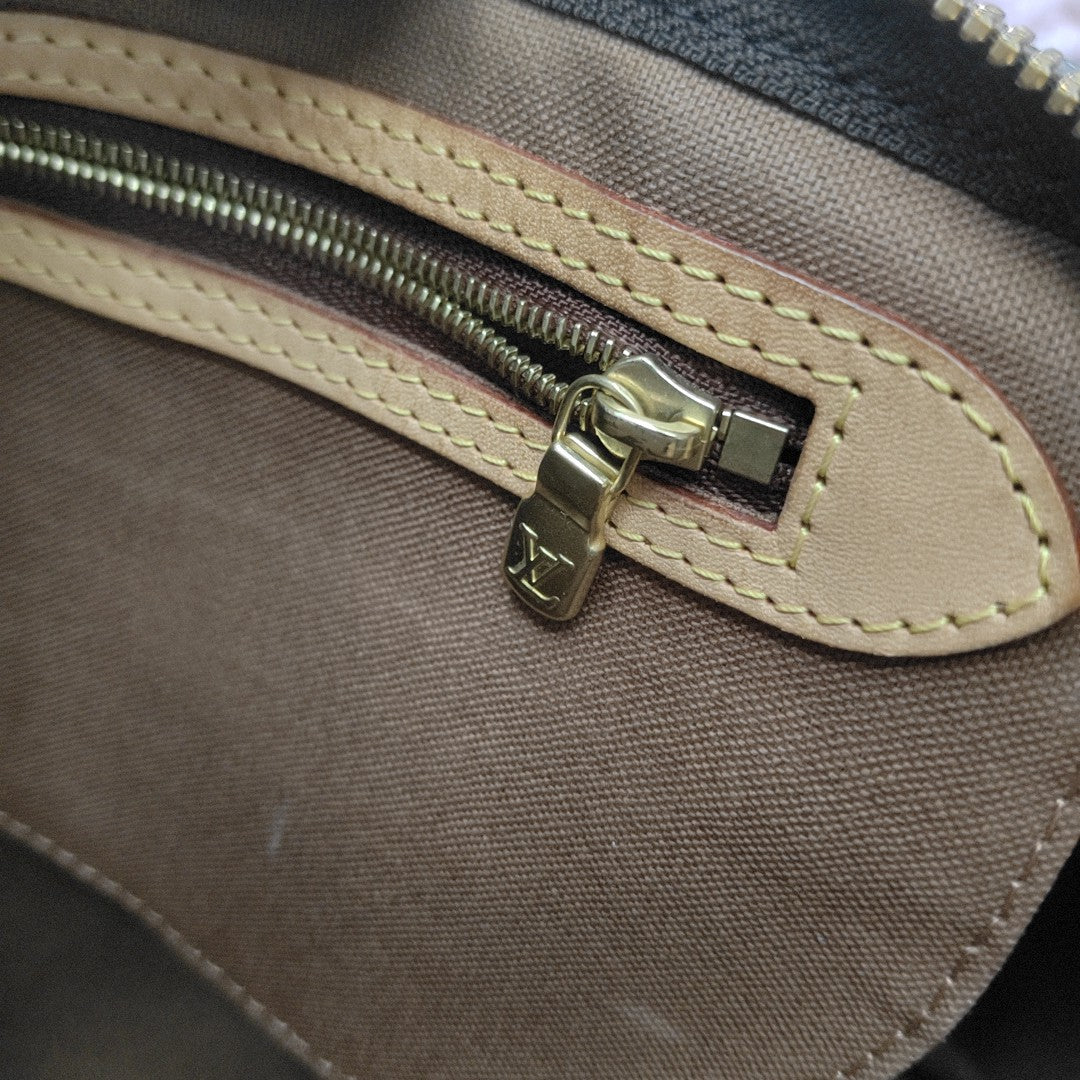 SPEEDY 25 Monogram Coated Canvas Brown