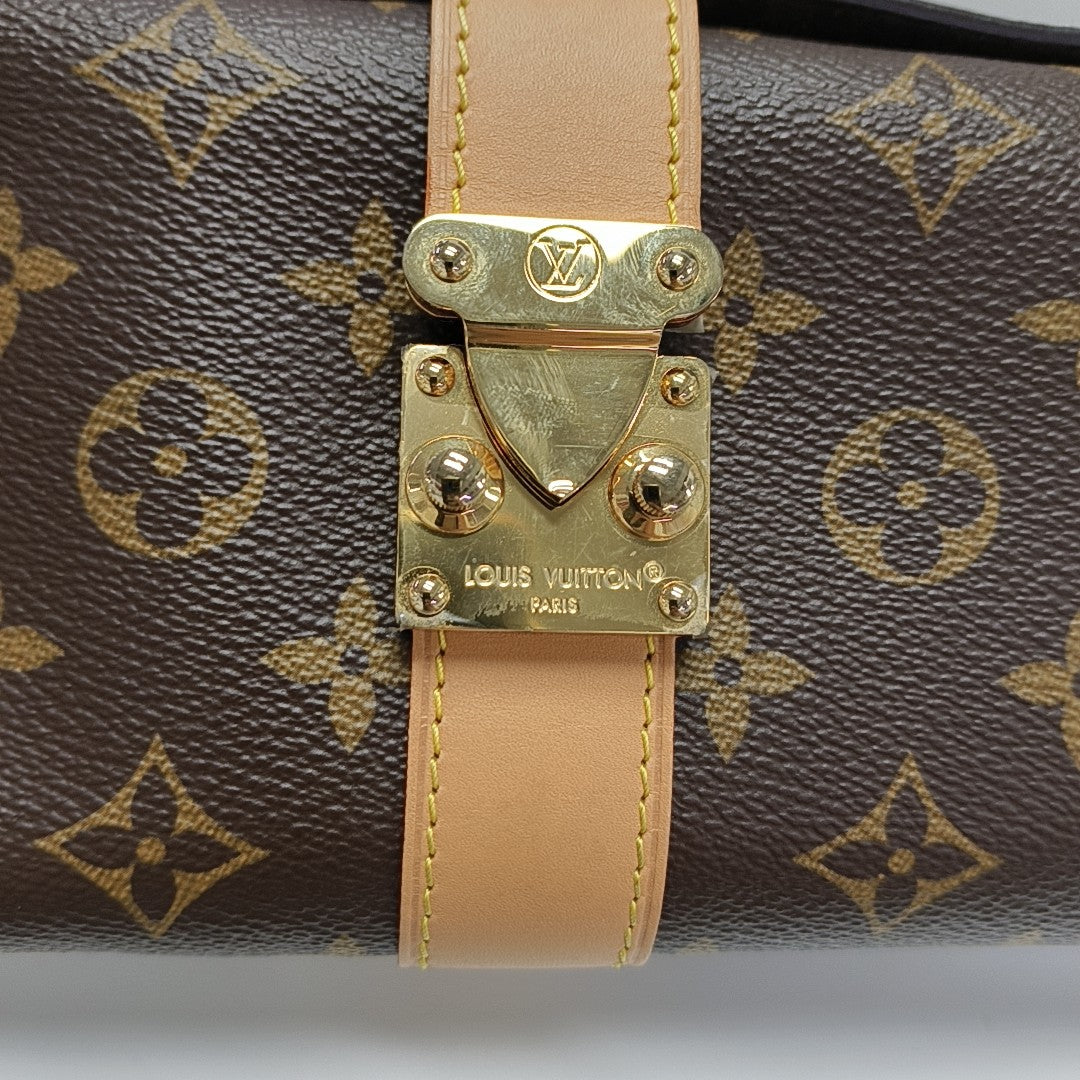 Pochette Mia Monogram Coated Canvas Brown