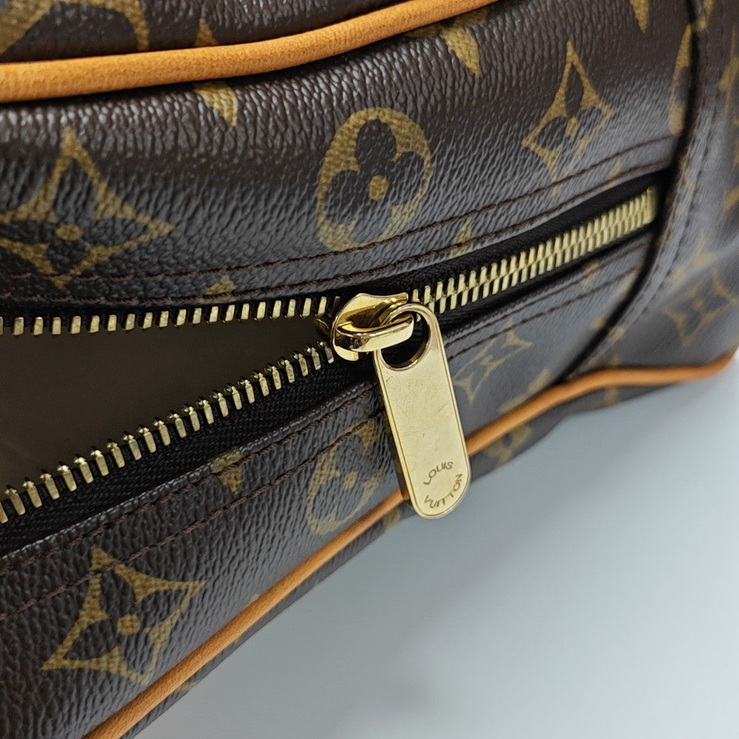 MANHATTAN GM Monogram Coated Canvas Brown