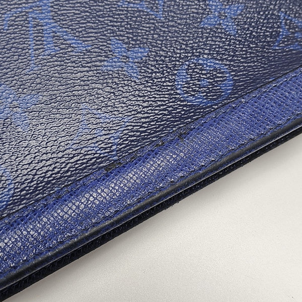 Pochette Voyag MM Monogram Coated Canvas Blue