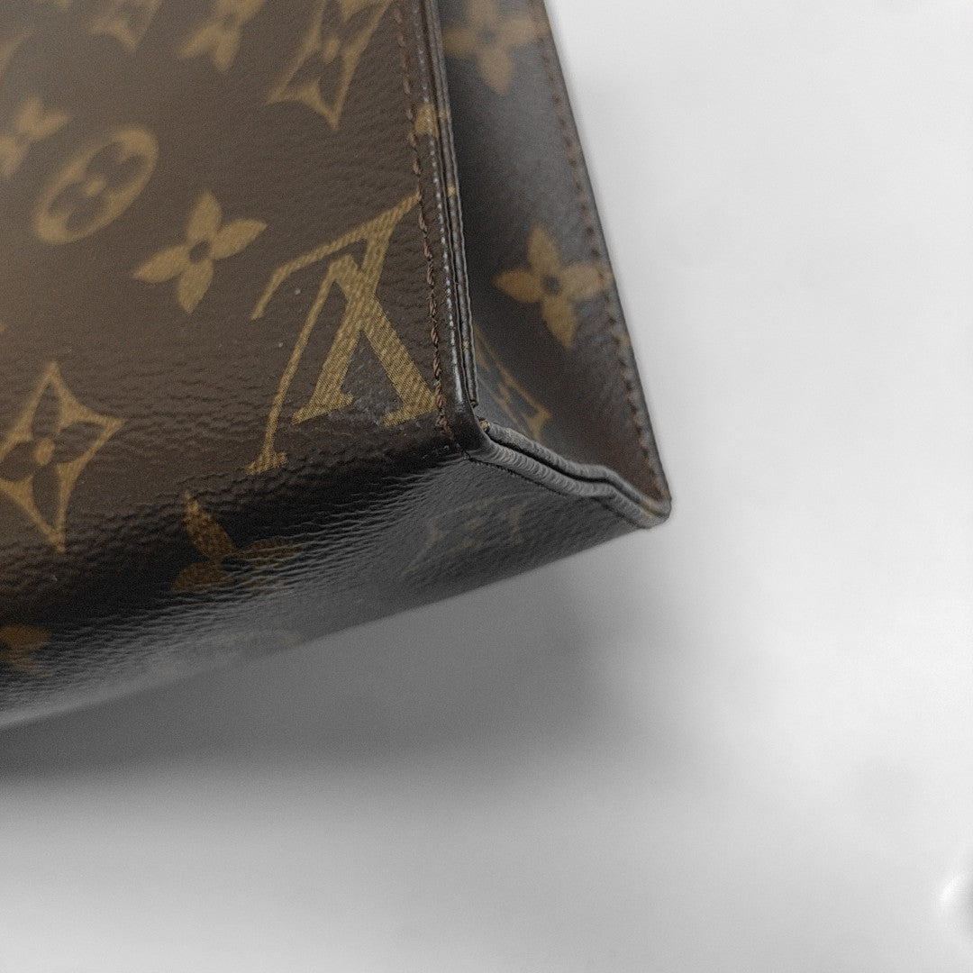 TOILET POCKET 19 Monogram Coated Canvas Brown