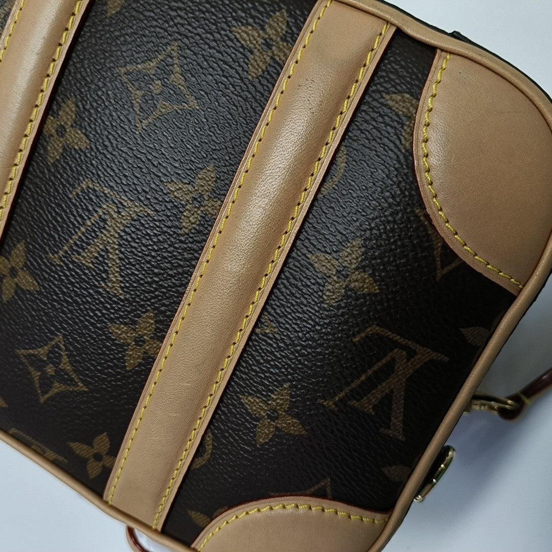 LUGGAGE Monogram Coated Canvas Brown