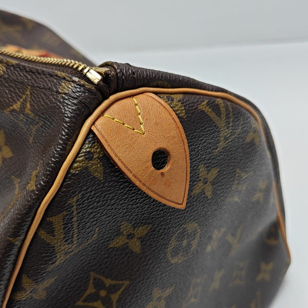 SPEEDY 30 Monogram Coated Canvas Brown