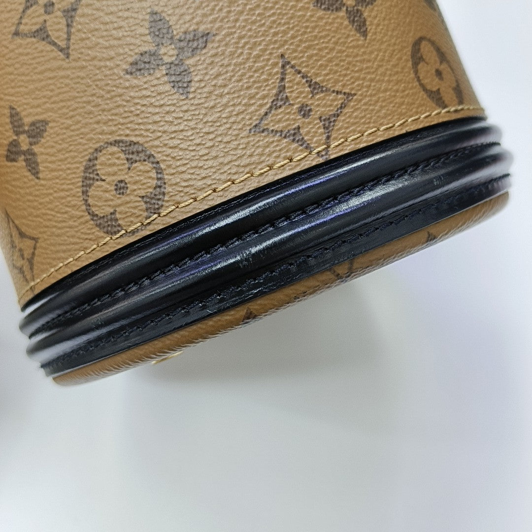 CANNES PM Monogram Coated Canvas Brown