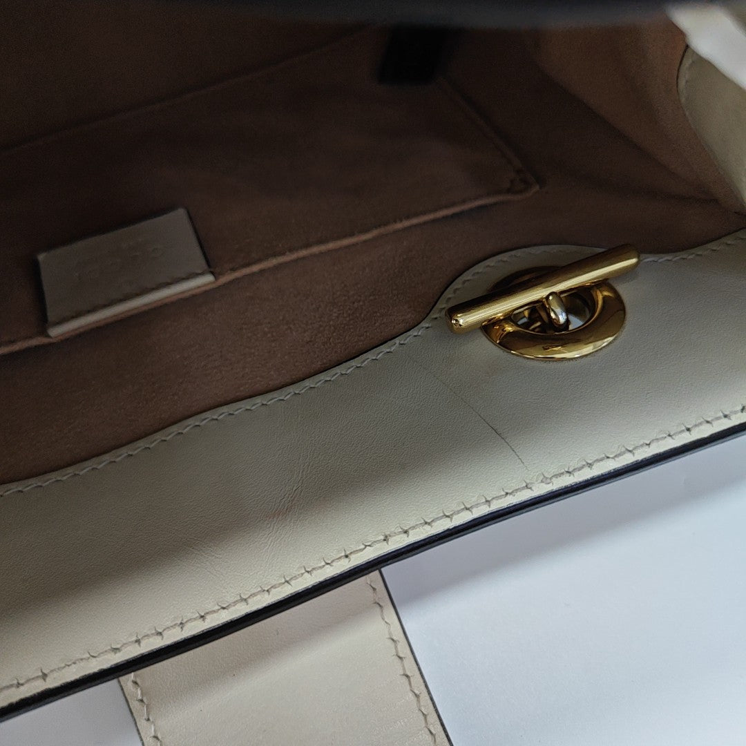 Padlock Small Monogram Coated Canvas Beige