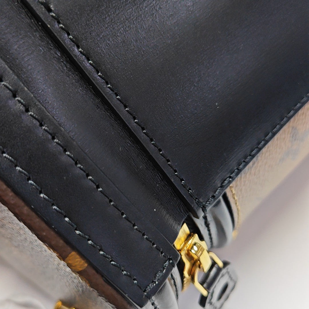 CANNES PM Monogram Coated Canvas Brown