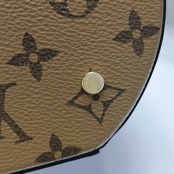 CANNES PM Monogram Coated Canvas Brown