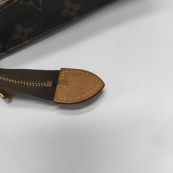 TOILET POCKET 19 Monogram Coated Canvas Brown