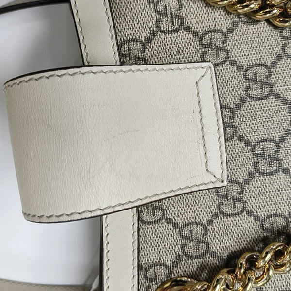 Padlock Small Monogram Coated Canvas Beige