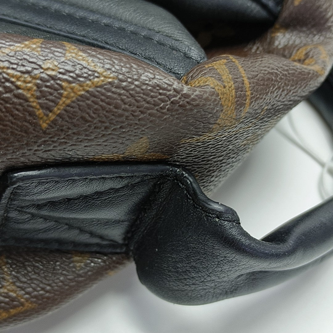 Monogram Coated Canvas Backpack Brown