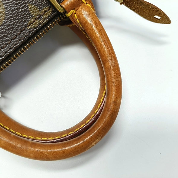 Authenticated pre-owned  SPEEDY Nano Monogram Coated Canvas Brown - Top Handle Bag at Looply