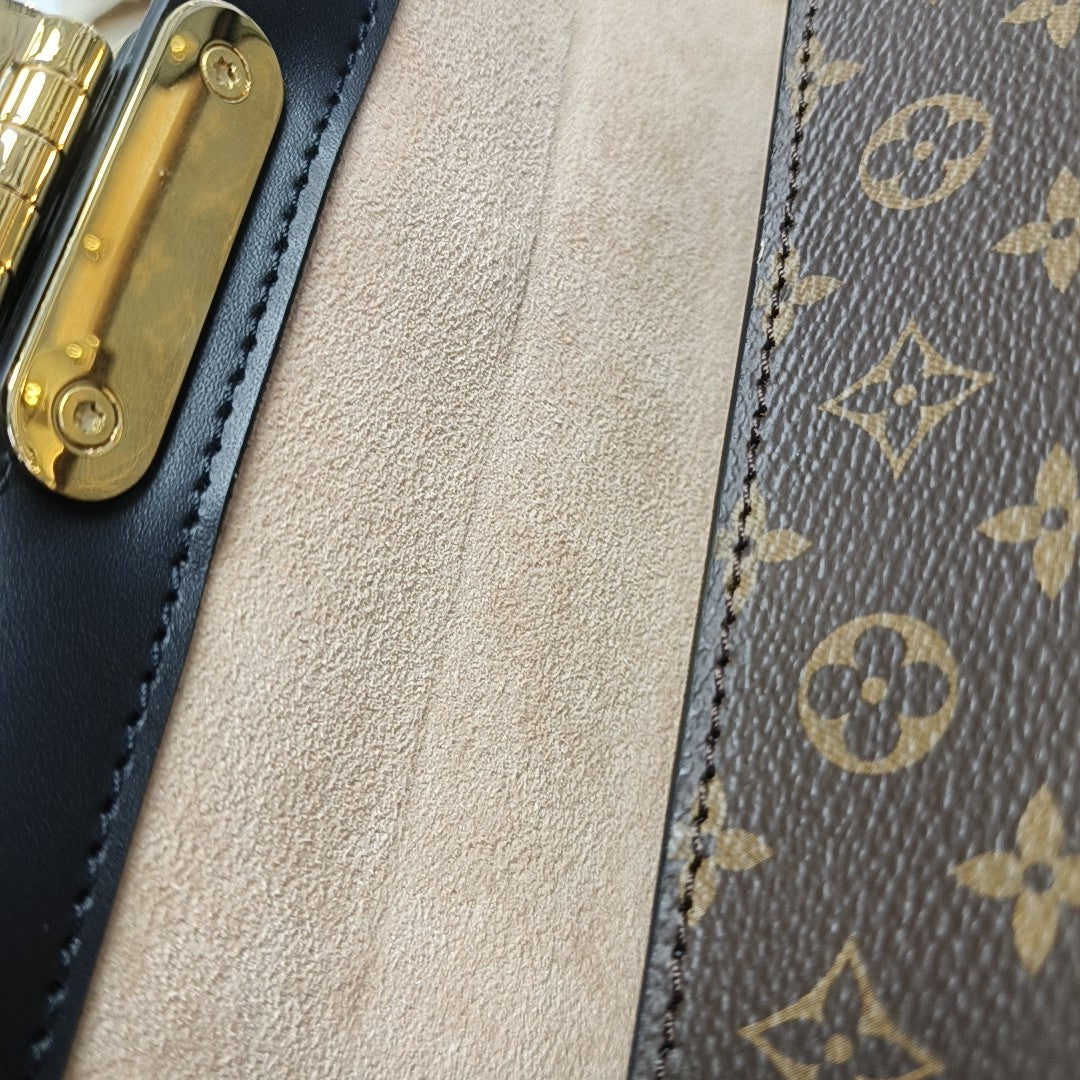 TRIANON PM Monogram Coated Canvas Brown