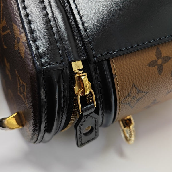 CANNES PM Monogram Coated Canvas Brown