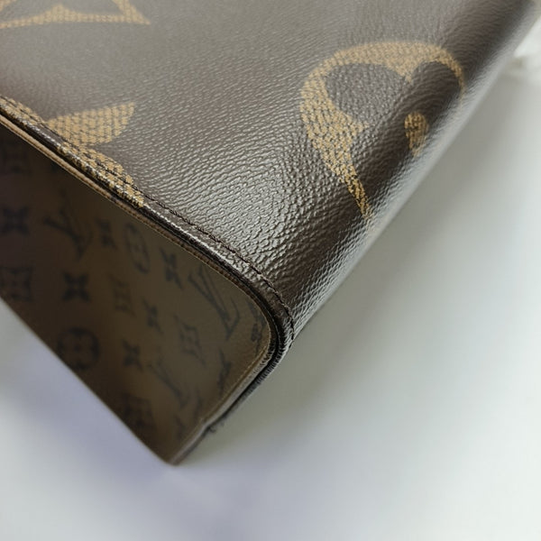ONTHEGO GM Monogram Coated Canvas Brown