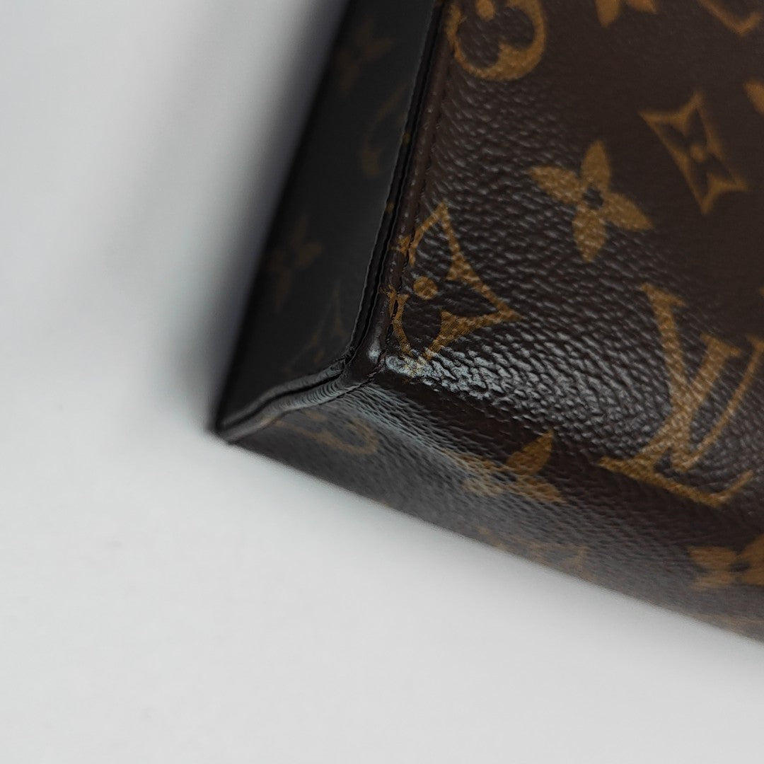TOILET POCKET 26 Monogram Coated Canvas Brown