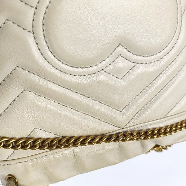 Authenticated pre-owned  GG Marmont Mini Quilted Calfskin White - Bucket Bag at Looply