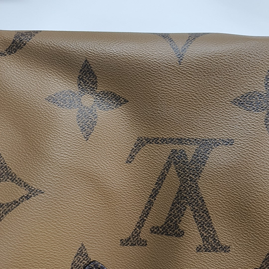 ONTHEGO MM Monogram Coated Canvas Brown